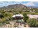 Aerial view of the property highlighting the pool and mountain views at 34221 N Boulders Pkwy, Scottsdale, AZ 85266