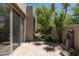 Flagstone pathway leads through the landscaped backyard with desert landscaping at 34221 N Boulders Pkwy, Scottsdale, AZ 85266