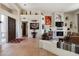 Spacious living room with tile flooring, fireplace, and desert decor, creating a stylish space at 34221 N Boulders Pkwy, Scottsdale, AZ 85266