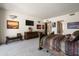 Spacious main bedroom with a neutral color palette, decorative artwork, and a serene ambiance at 34221 N Boulders Pkwy, Scottsdale, AZ 85266