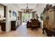 Bright home office with outdoor access, custom desk and lighting fixtures at 34221 N Boulders Pkwy, Scottsdale, AZ 85266