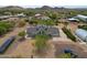 Aerial view of home with solar panels, desert landscaping and a unique, modern window feature at 37414 N 17Th Ave, Phoenix, AZ 85086