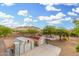 This property features two sheds, patio, and a playground against a mountainous backdrop, perfect for outdoor enjoyment at 37414 N 17Th Ave, Phoenix, AZ 85086