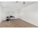 Spacious basement area ready for customization and featuring carpeted floors at 37414 N 17Th Ave, Phoenix, AZ 85086