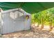 Backyard chicken coop features sunflower wreath and ventilation at 37414 N 17Th Ave, Phoenix, AZ 85086