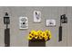 Wall decor featuring farm fresh theme with decorative lights and sunflower basket at 37414 N 17Th Ave, Phoenix, AZ 85086
