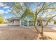 Single story house featuring a unique stonework entryway and large picture windows at 37414 N 17Th Ave, Phoenix, AZ 85086