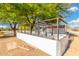 Sturdy horse pen construction with robust white siding, perfect for equestrian enthusiasts seeking a secure and functional space at 37414 N 17Th Ave, Phoenix, AZ 85086