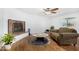 Cozy living room with hardwood floors, fireplace and neutral decor at 37414 N 17Th Ave, Phoenix, AZ 85086