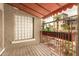 Enjoy this quaint balcony that has orange guard rails, wooden decking and faces an outdoor courtyard area at 387 N 2Nd Ave # F2, Phoenix, AZ 85003