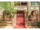 Inviting gated entrance to the building, featuring detailed stonework at 387 N 2Nd Ave # F2, Phoenix, AZ 85003