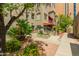 Complex has exterior residential units with personal balconies and patios surrounded by natural landscape at 387 N 2Nd Ave # F2, Phoenix, AZ 85003
