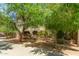 Well-kept building with mature trees providing shade and curb appeal at 387 N 2Nd Ave # F2, Phoenix, AZ 85003