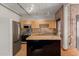 Well-equipped kitchen with stainless steel appliances, and tile countertops at 387 N 2Nd Ave # F2, Phoenix, AZ 85003
