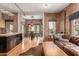 Inviting living space with exposed brick walls, wood floors, and views at 387 N 2Nd Ave # F2, Phoenix, AZ 85003