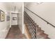 Hallway and stairway with neutral walls and patterned carpet runner at 387 N 2Nd Ave # F2, Phoenix, AZ 85003