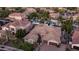 Aerial view of a luxury home showcasing a resort-style pool and beautifully landscaped grounds at 4281 S Iowa St, Chandler, AZ 85248