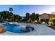Backyard oasis with pool, fire pit, and lounge area, ideal for outdoor relaxation and entertainment at 4281 S Iowa St, Chandler, AZ 85248
