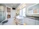 This spacious bathroom features a soaking tub, walk-in shower, and double vanities at 4281 S Iowa St, Chandler, AZ 85248
