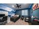 Stylish bedroom with a mural, accent lighting, modern decor, and a ceiling fan at 4281 S Iowa St, Chandler, AZ 85248