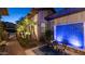 Private courtyard featuring a water feature, lush landscaping, and an intimate outdoor seating area at 4281 S Iowa St, Chandler, AZ 85248