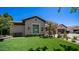 Charming home featuring manicured lawn, desert landscaping, and attractive exterior finishes at 4281 S Iowa St, Chandler, AZ 85248