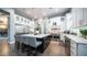 Beautiful open kitchen with white cabinets, stainless steel appliances, and a large island with seating at 4281 S Iowa St, Chandler, AZ 85248