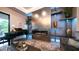 Stylish living room features fireplace, piano, and sleek design elements at 4281 S Iowa St, Chandler, AZ 85248