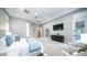 Expansive main bedroom with a tray ceiling, sitting area, and ample space at 4281 S Iowa St, Chandler, AZ 85248