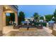 Spacious covered patio area with comfortable seating and an outdoor grill perfect for entertaining at 4281 S Iowa St, Chandler, AZ 85248