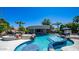 Resort style pool with swim up bar, jacuzzi, and a rock waterfall feature at 4281 S Iowa St, Chandler, AZ 85248