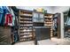 Custom walk-in closet with shelving and storage solutions for clothing, shoes, and accessories at 4281 S Iowa St, Chandler, AZ 85248