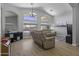 Bright living room featuring cathedral ceilings, lots of light and open concept at 43283 W Hillman Dr, Maricopa, AZ 85138