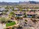 Magnificent aerial view of desert home with pool, spa, and mountain views at 5033 N 205Th Gln, Buckeye, AZ 85396