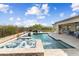 Backyard retreat showcasing a pool, spa, and well-maintained desert landscaping at 5033 N 205Th Gln, Buckeye, AZ 85396