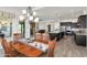 Open dining area adjacent to the kitchen and living room, perfect for entertaining and Gathering gatherings at 5033 N 205Th Gln, Buckeye, AZ 85396