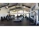 Well-equipped fitness center with state-of-the-art cardio machines and ample natural light at 5033 N 205Th Gln, Buckeye, AZ 85396