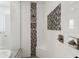 The shower features a tiled surround with built-in shower niche at 5033 N 205Th Gln, Buckeye, AZ 85396