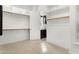 This spacious walk-in closet features built-in shelving and storage space at 5033 N 205Th Gln, Buckeye, AZ 85396