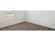 Empty bedroom with neutral carpeting, a window, and ready for personalized touches at 51134 W Bluejay St, Maricopa, AZ 85139