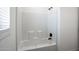A clean and modern bathroom features tiled shower at 51942 W Sotol Rd, Maricopa, AZ 85139