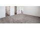 This bedroom features plush carpeting, large windows, and ample space at 51942 W Sotol Rd, Maricopa, AZ 85139