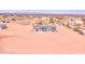 Single story home with gray roof on a large desert lot with light landscaping at 51942 W Sotol Rd, Maricopa, AZ 85139
