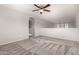 Spacious bonus room features plush carpet flooring and views of the home's second level at 5232 N 16Th Ln, Phoenix, AZ 85015