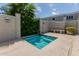 A view of a hot tub with tile and fence surround at 5232 N 16Th Ln, Phoenix, AZ 85015