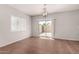 The living room features tile floors, a ceiling fan and a sliding glass door to the backyard at 5232 N 16Th Ln, Phoenix, AZ 85015