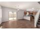 The living room has tile floors, a ceiling fan and a sliding glass door to the back patio at 5232 N 16Th Ln, Phoenix, AZ 85015