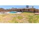 Expansive backyard with a private pool, covered patio, and ample green space at 5320 W Maui Ln, Glendale, AZ 85306