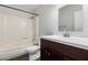 Bathroom features vanity, sink, and a shower-tub combo at 5320 W Maui Ln, Glendale, AZ 85306