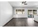 Bright dining area with ceiling fan and sliding door to the backyard at 5320 W Maui Ln, Glendale, AZ 85306